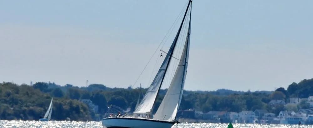 Boats docked at marina slips